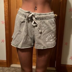 Gray athletic shorts, outer banks graphic, size medium